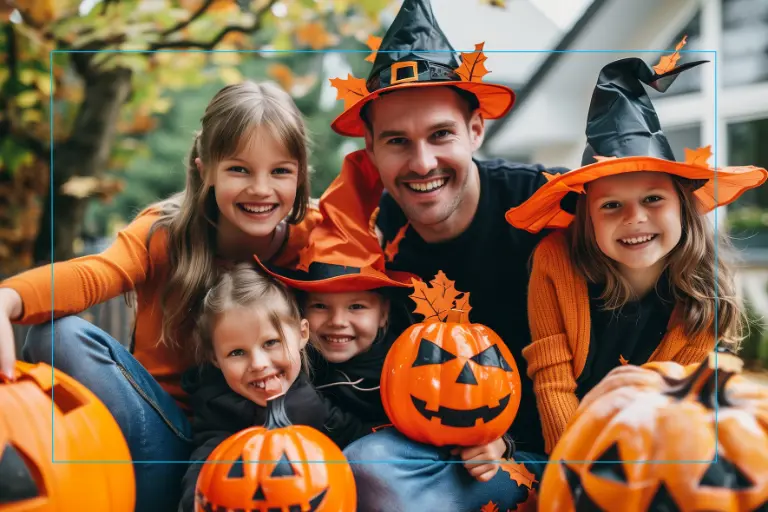 A parent and their children in Halloween Costumes
