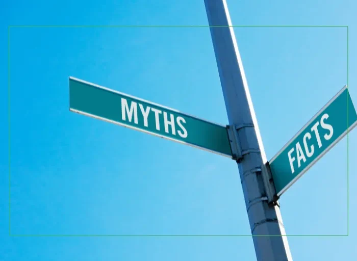 Street sign with Myths on one sign and Facts on the other sign