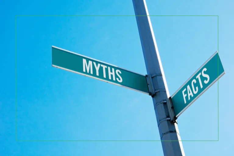 Street sign with Myths on one sign and Facts on the other sign